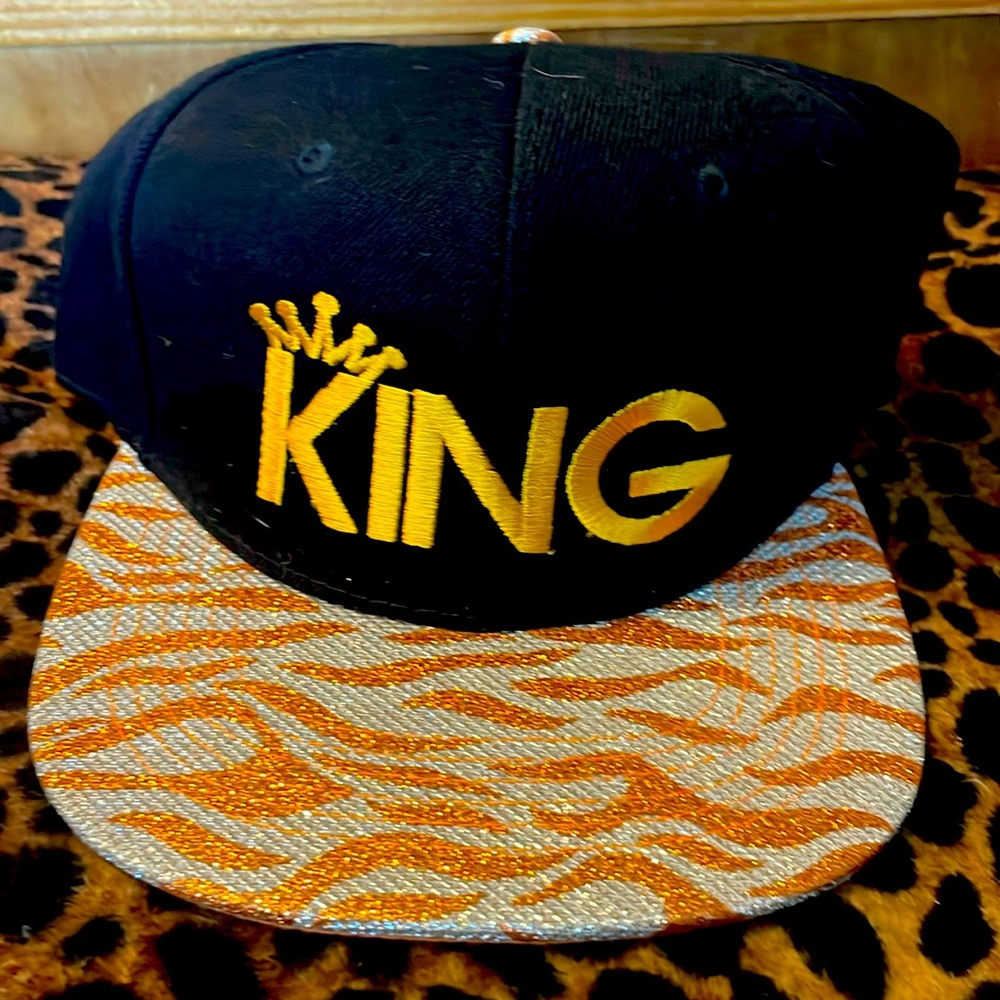 King with the crown and would go with your outfit